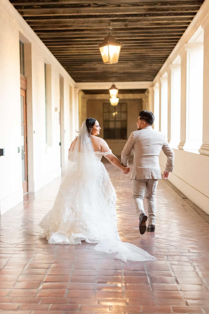 couple running in pasadena city hall