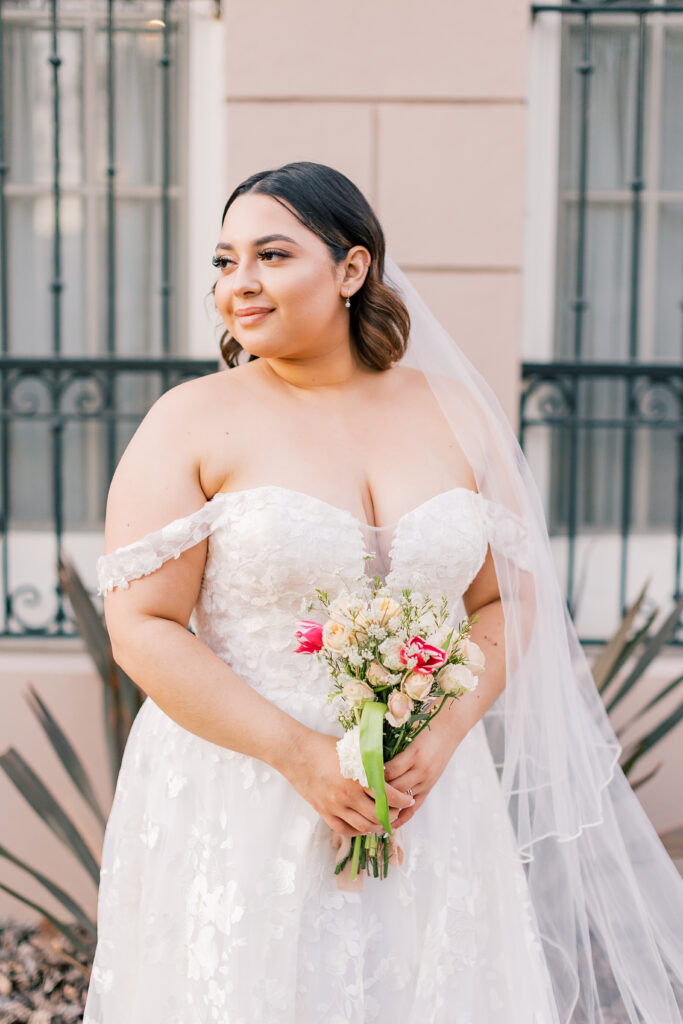 Close up of bride holding flowers