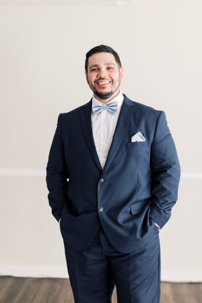 Groom smiling to the camera