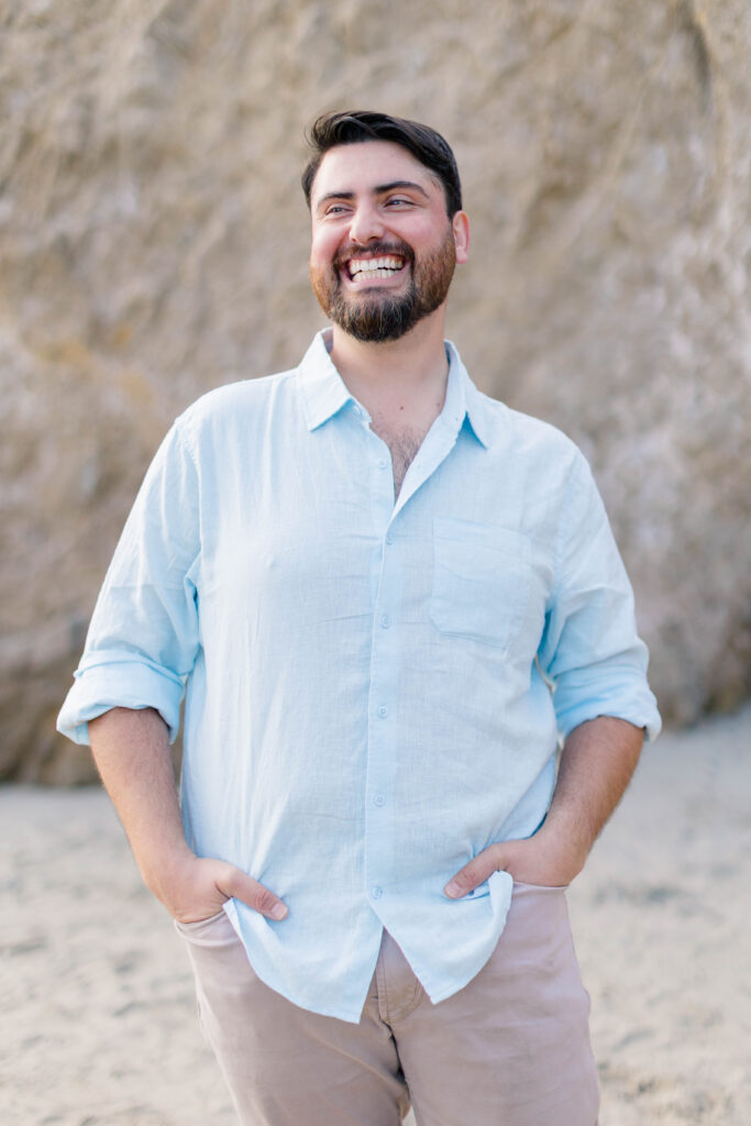 Man posing at a Malibu Beach